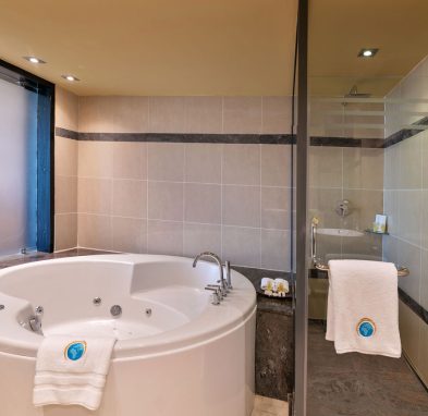 Speke resort Munyonyo -presidential suite bedroom